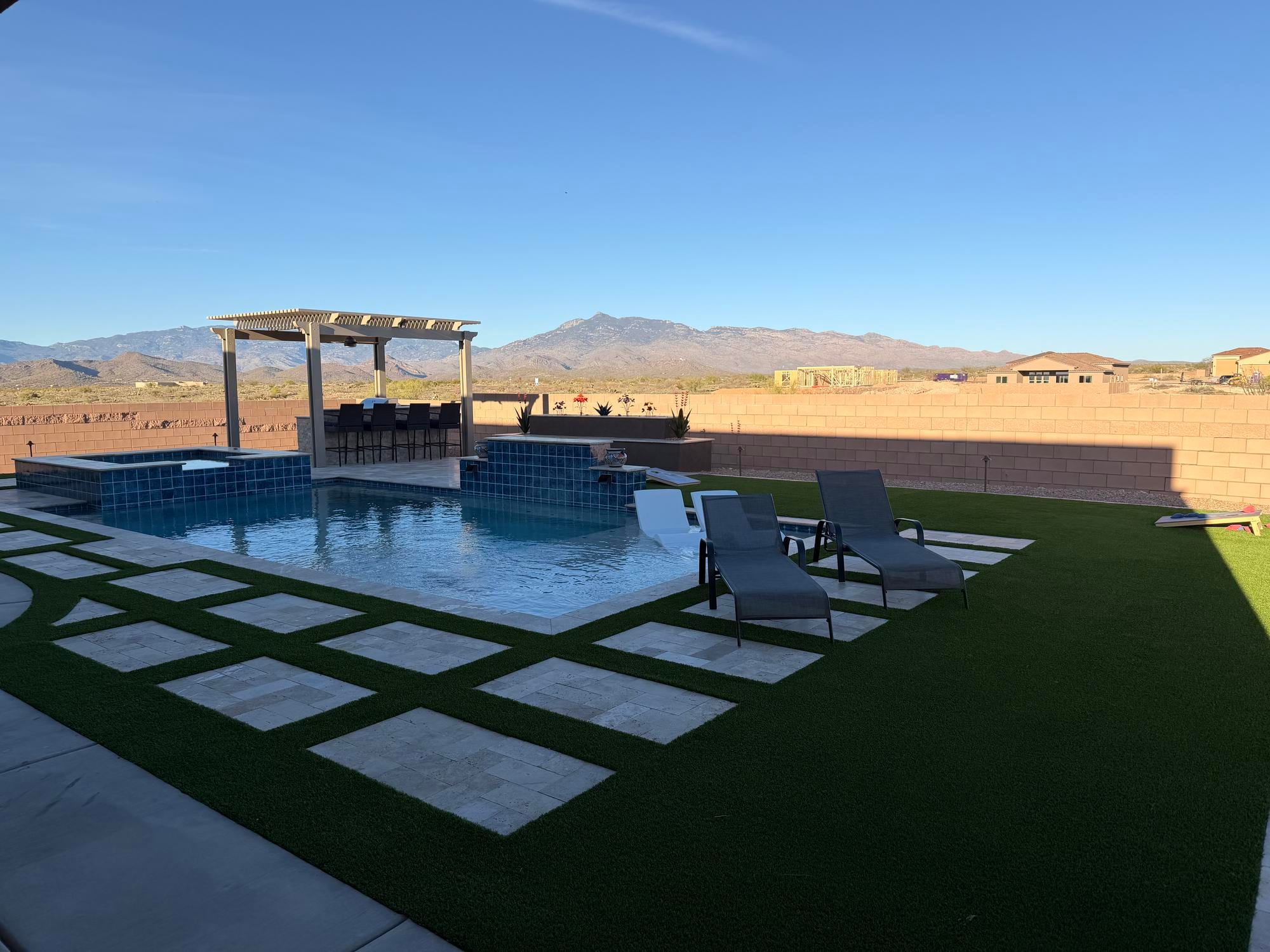 Custom pergola shade structure over a paver patio in SaddleBrooke by Sorce Signature Outdoors